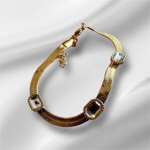 Elegant Gold Herringbone Bracelet with Crystal Accents